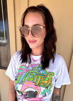 Ella in Brown Sunglasses