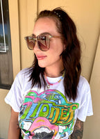 Ella in Brown Sunglasses